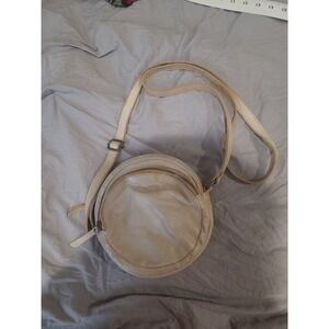 Latico small circle shoulder bag beige pebbled leather adj. Strap, Zip closure